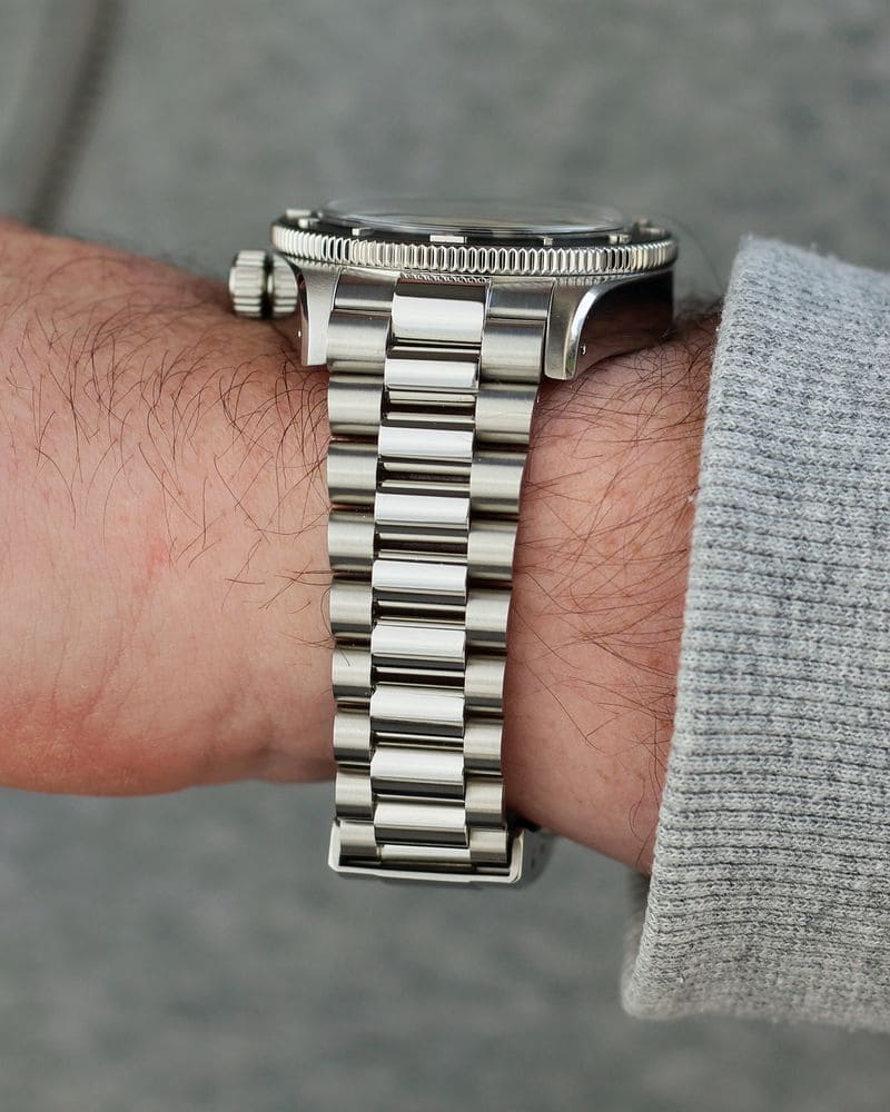 Wrist Wearing An Escudo Ocean Seacrest Black Ice Silver Dial Watch 